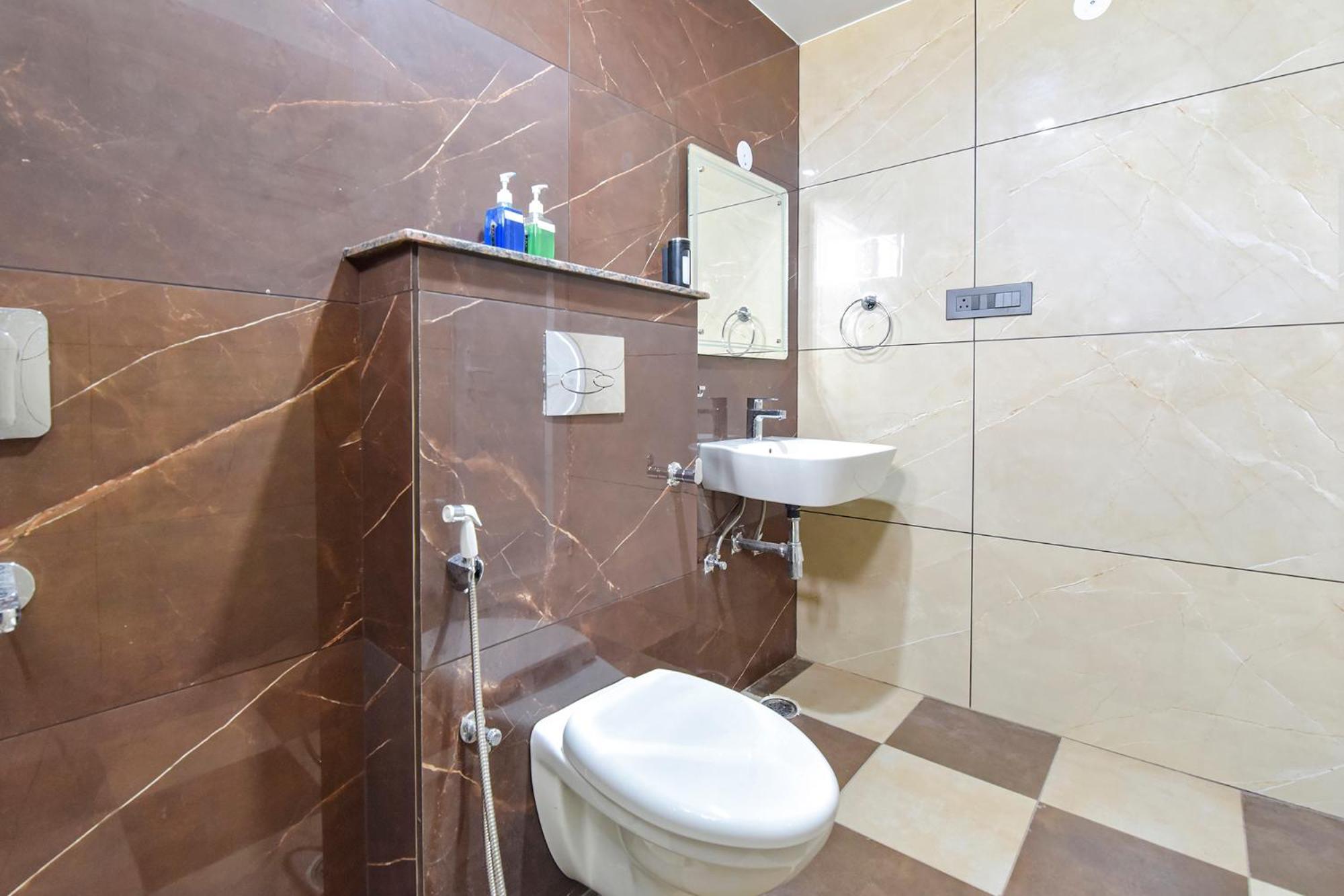 Fabhotel Elite Clement Town 外观 照片